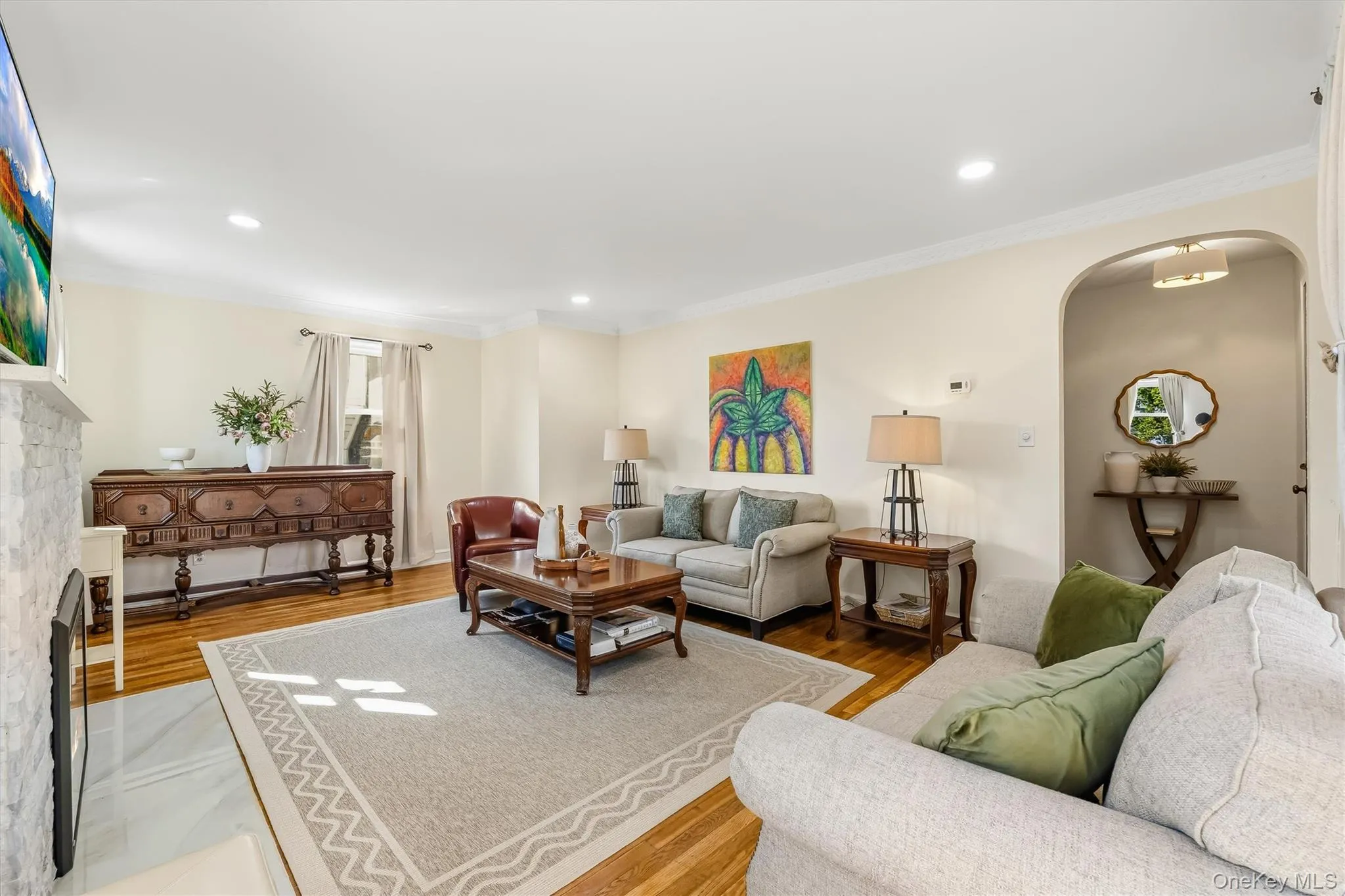 An expansive layout and modern fireplace create a comfortable setting for everyday living and entertaining. An expansive layout and modern fireplace create a comfortable setting for everyday living and entertaining.