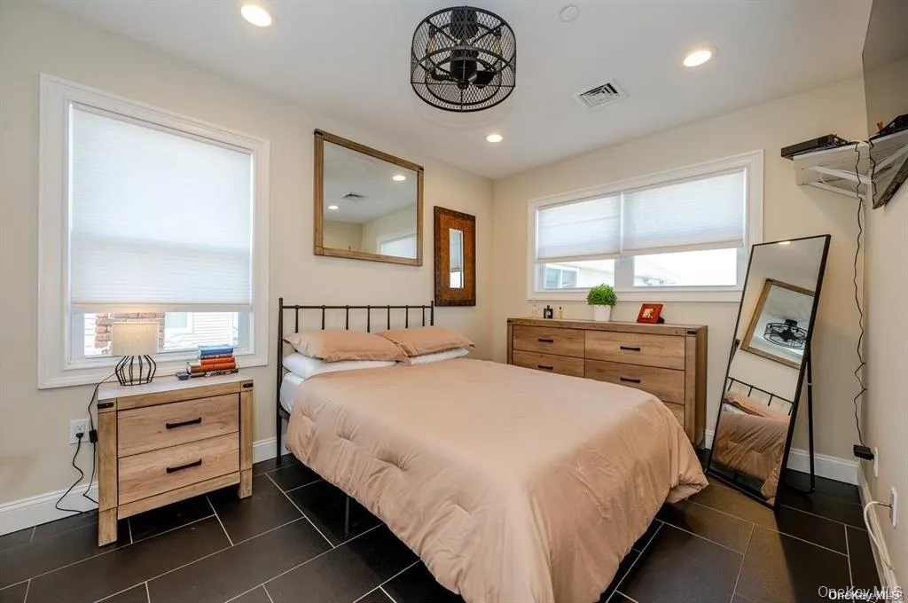 Bedroom with recessed lighting and ceiling fan Bedroom with recessed lighting and ceiling fan