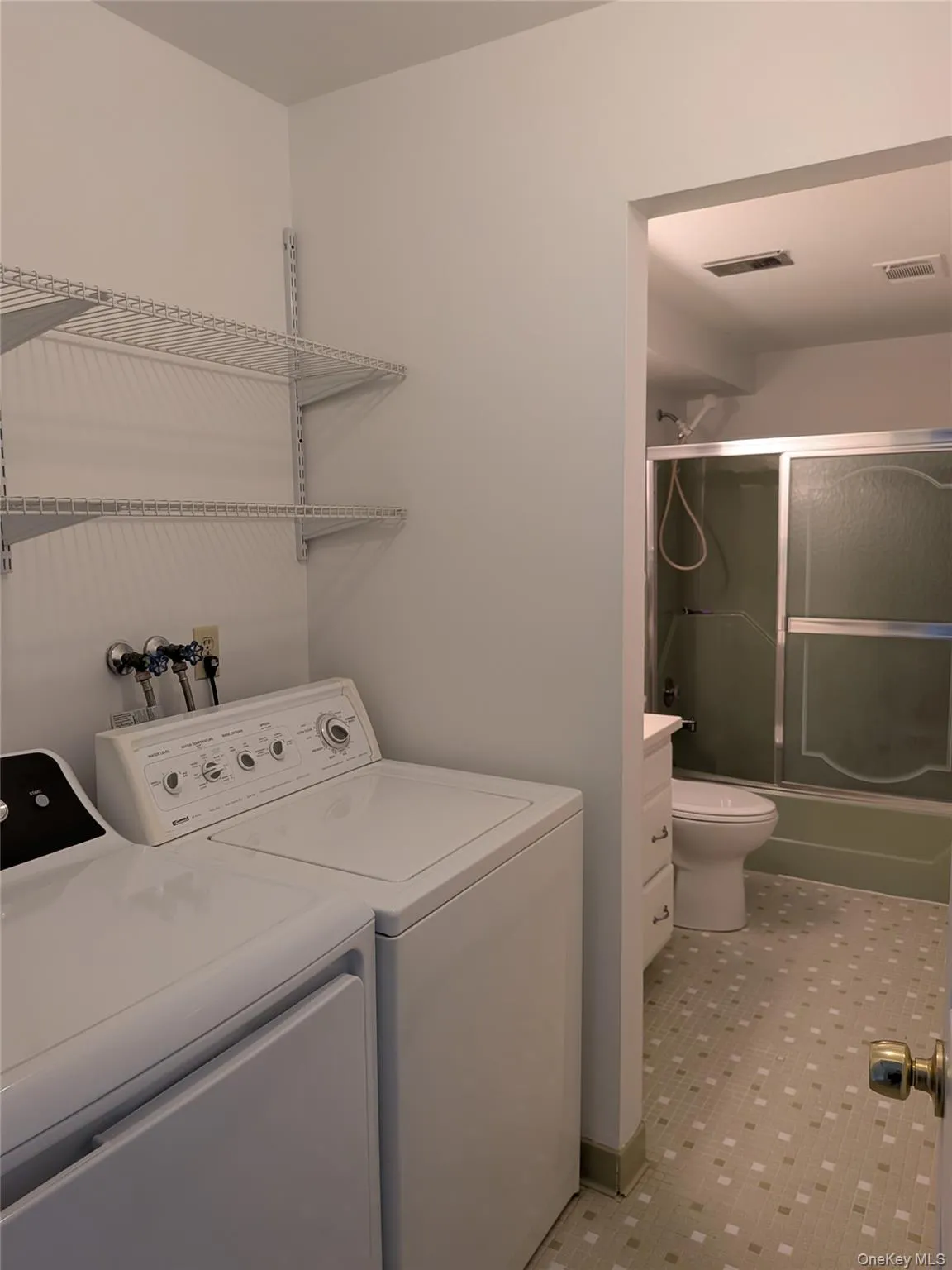 Washer & dryer and shelving Washer & dryer and shelving