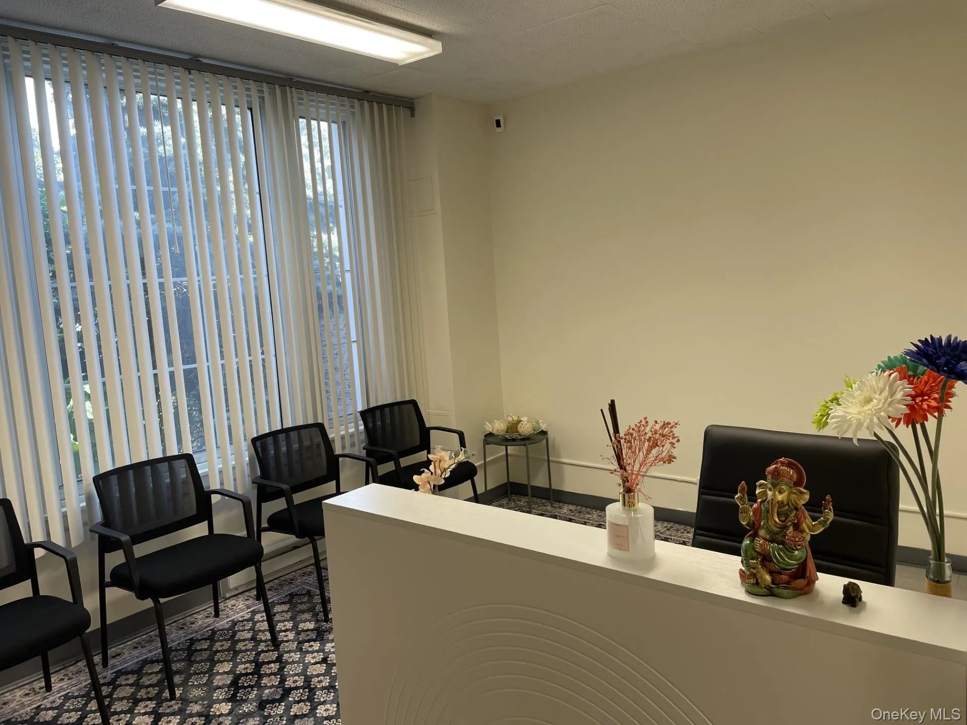 Welcome to GF-8. Recessed lighting fixture, vertical window blinds, and light-toned wall finishes Welcome to GF-8. Recessed lighting fixture, vertical window blinds, and light-toned wall finishes