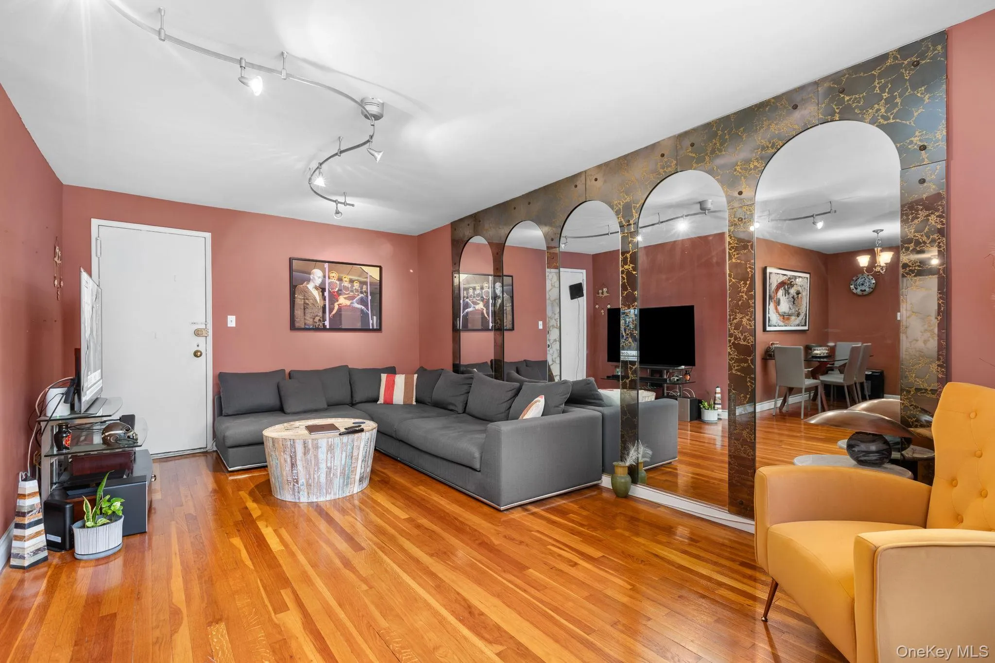 Warm wood-finish flooring complements the interior wall color Warm wood-finish flooring complements the interior wall color
