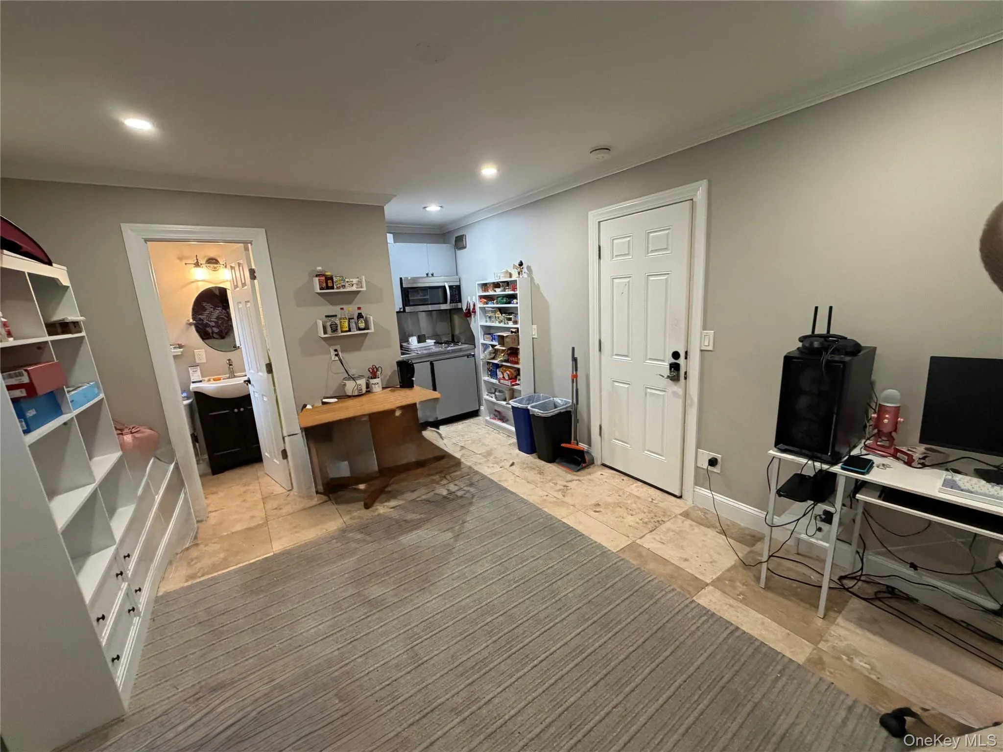 Main space looking at bathroom, kitchen and front door Main space looking at bathroom, kitchen and front door