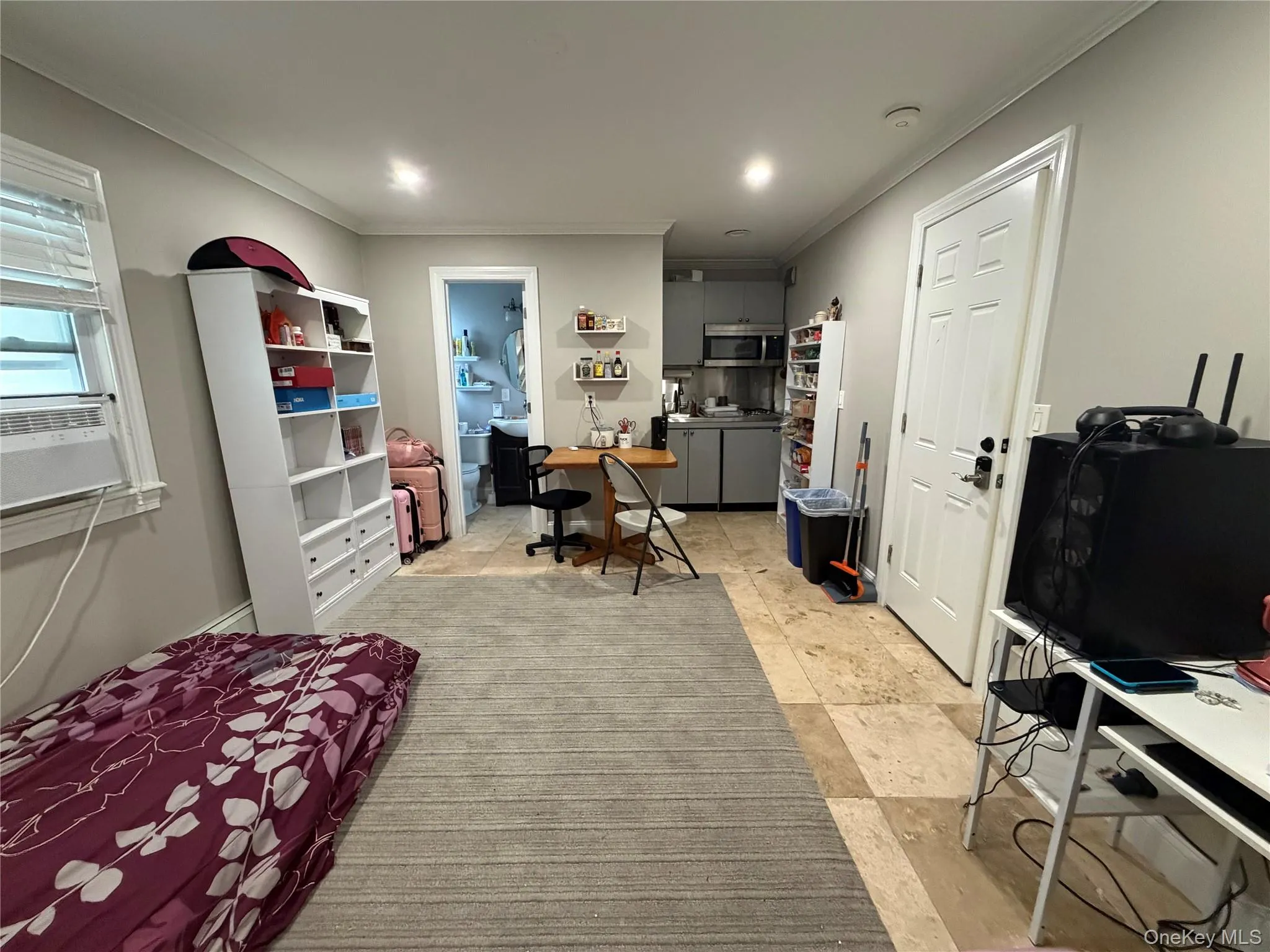 Main Living Space looking towards kitchen are and bathroom Main Living Space looking towards kitchen are and bathroom
