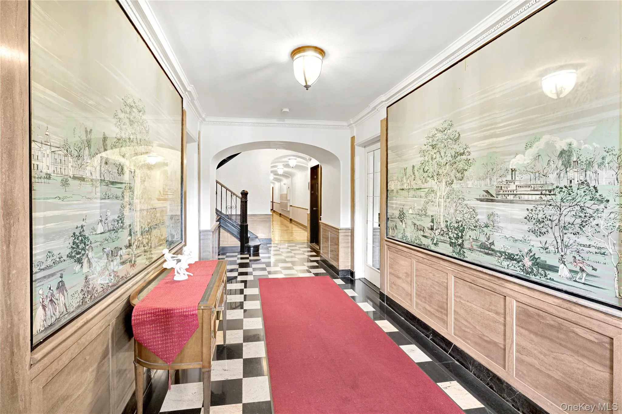 Lobby w/marble checkerboard floors and painted murals Lobby w/marble checkerboard floors and painted murals