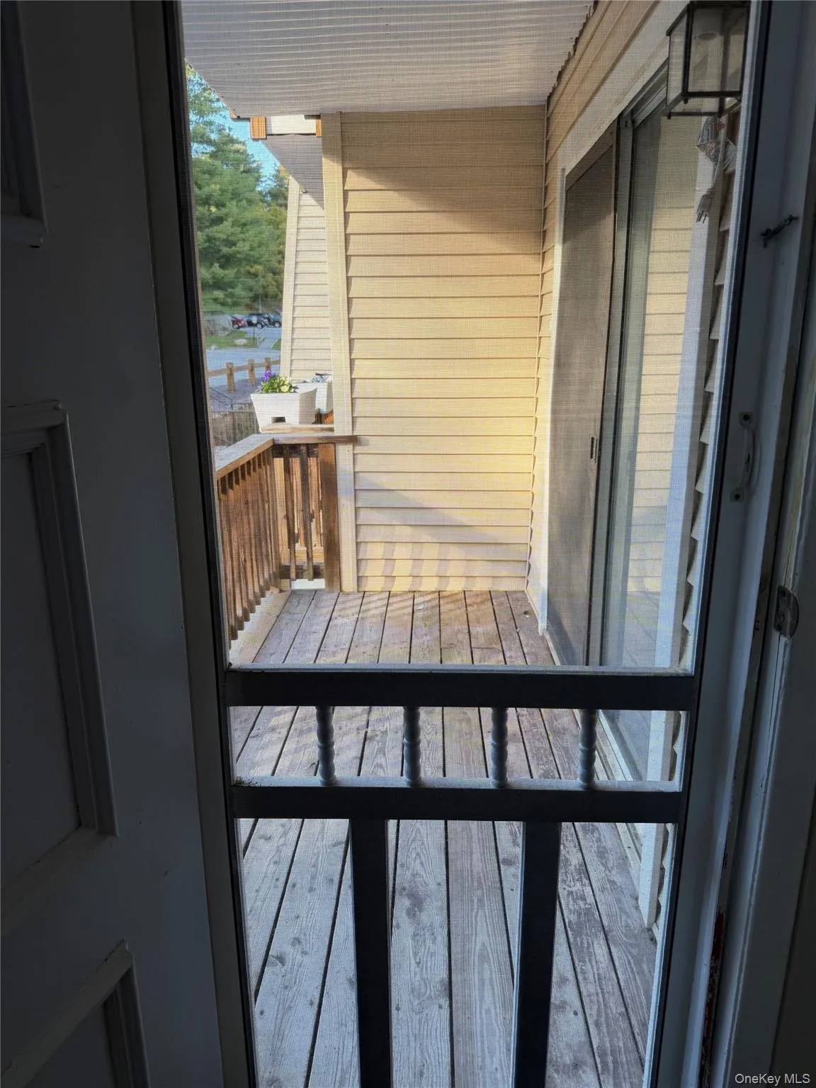 Balcony with access from living room and bedroom. Balcony with access from living room and bedroom.