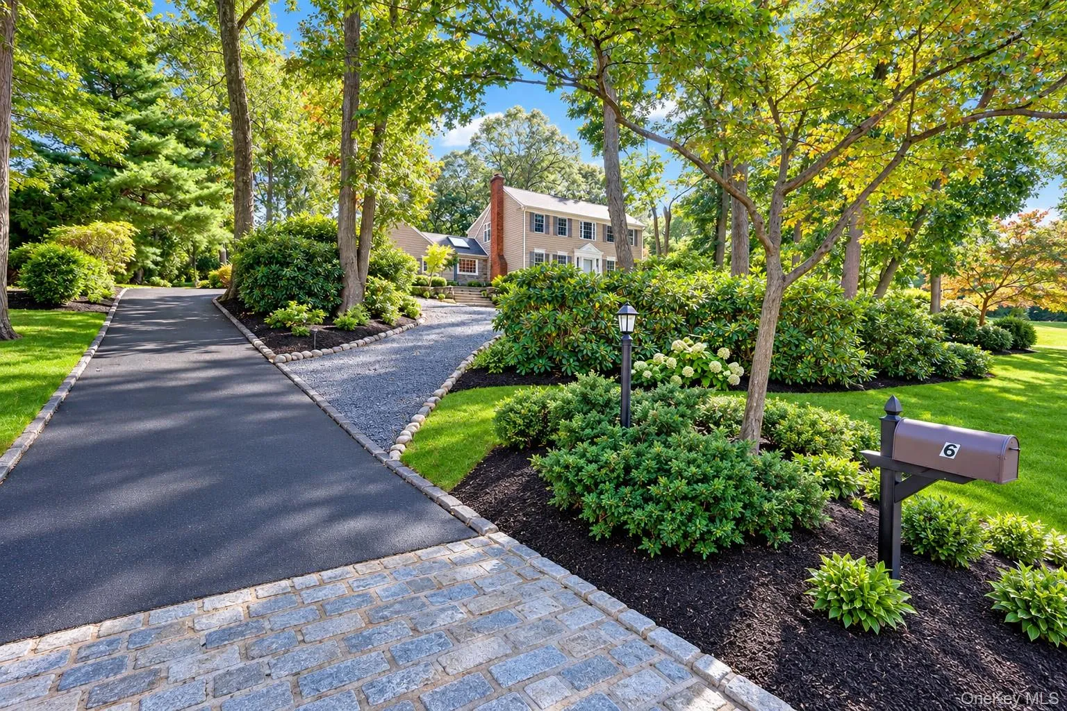 2 Driveways! One Leading to the 2 Car Garage With No Steps, and Circular Driveway With Steps and Walkway to Front Door 2 Driveways! One Leading to the 2 Car Garage With No Steps, and Circular Driveway With Steps and Walkway to Front Door
