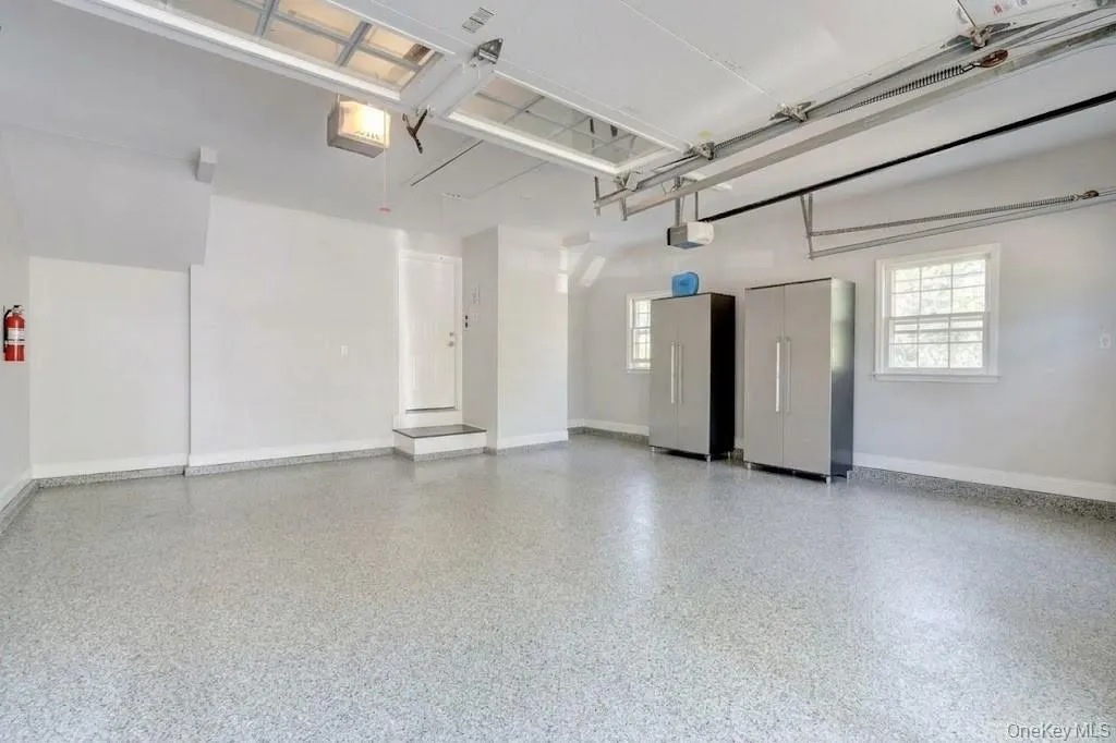 Two Car Garage With Epoxy Floor & New Garage Door Openers Two Car Garage With Epoxy Floor & New Garage Door Openers