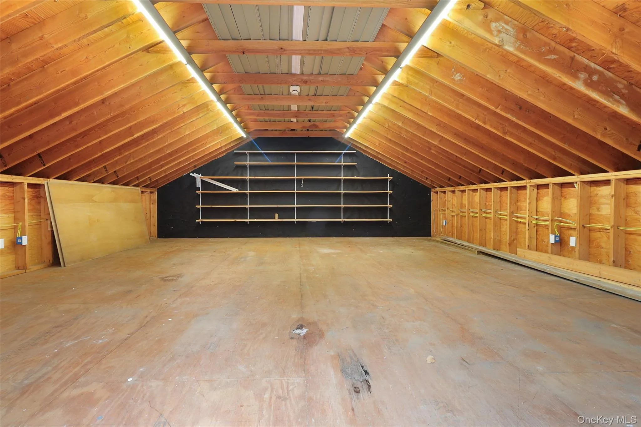 This storage area/loft is located on top of the new two car garage This storage area/loft is located on top of the new two car garage