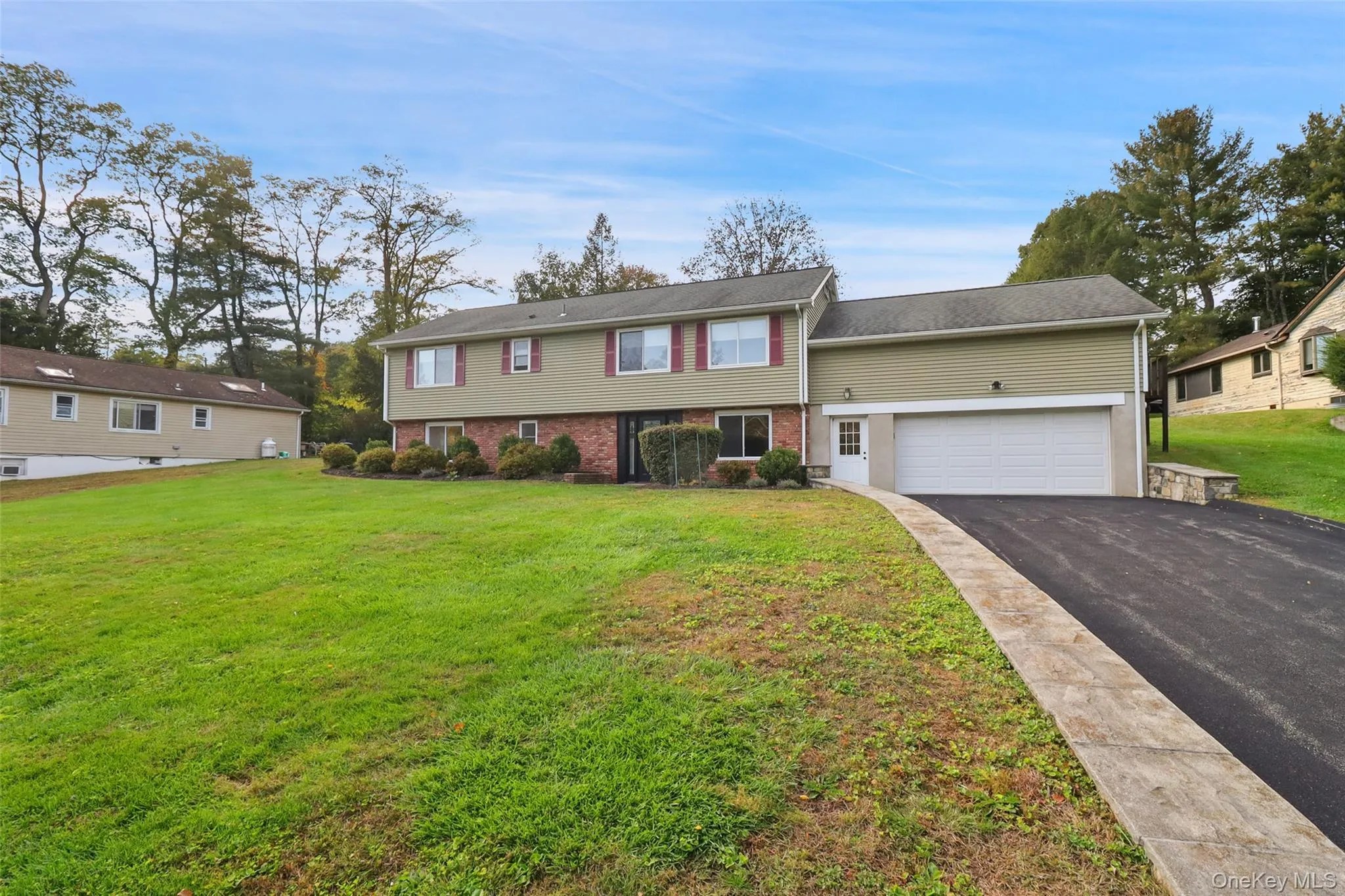 With attached two car garage plus one extra bay With attached two car garage plus one extra bay