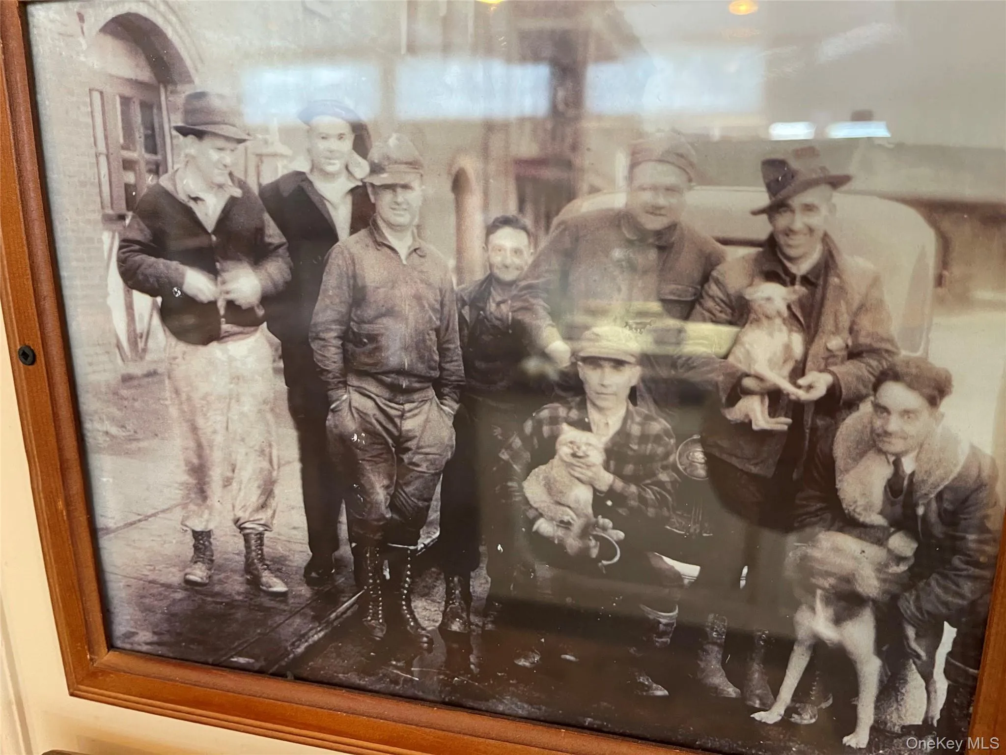 The Babe (third person from right) just outside the American House (to the left) on the Winkler Place side. The Babe (third person from right) just outside the American House (to the left) on the Winkler Place side.