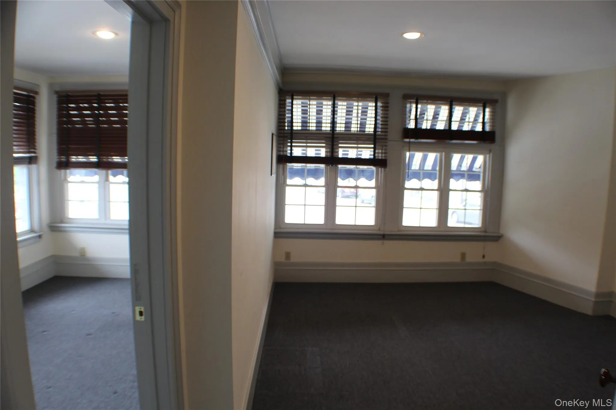 The view of both offices upon entering from hallway -- so many windows and natural light! The view of both offices upon entering from hallway -- so many windows and natural light!