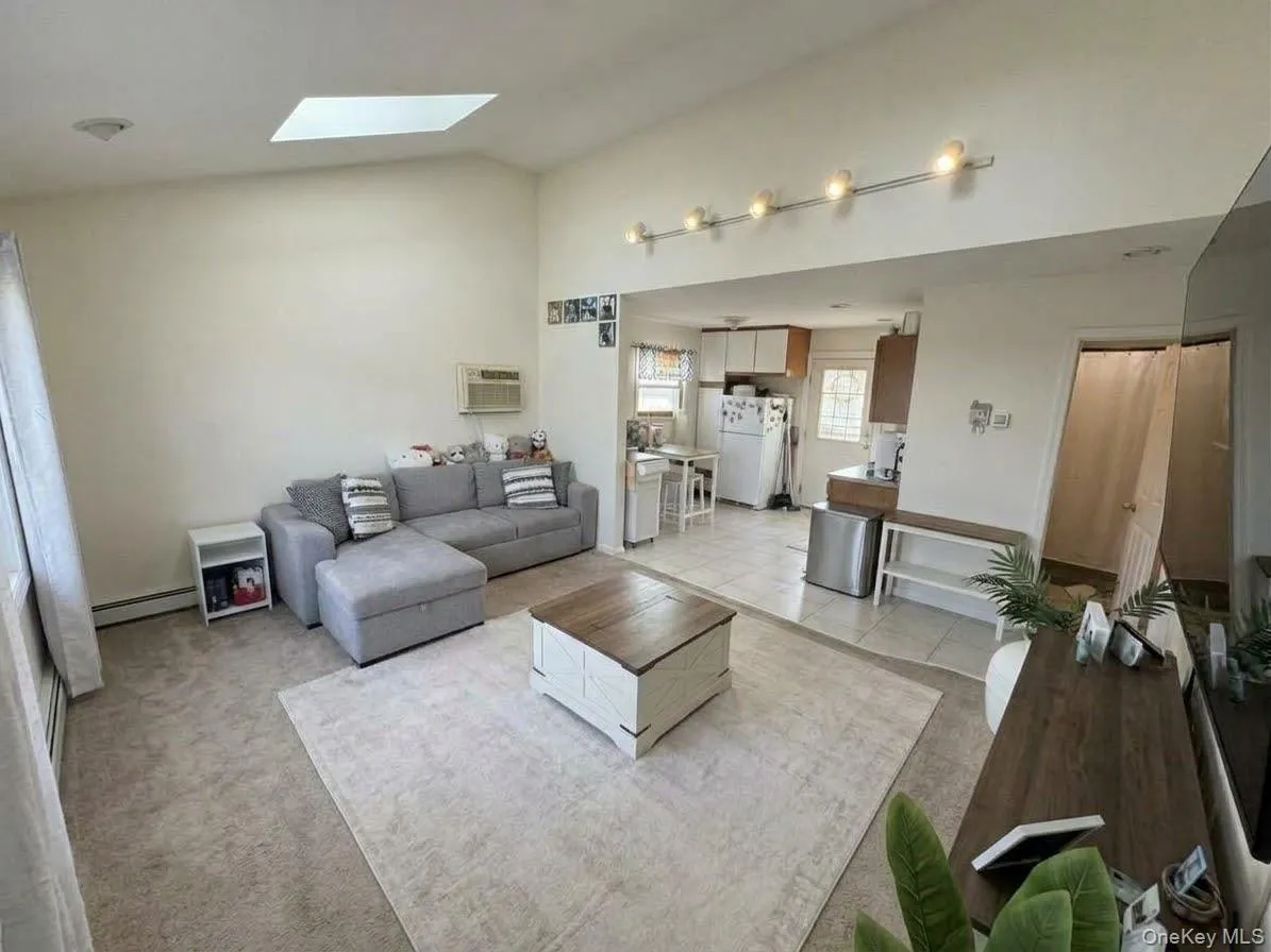 Open living area with bay window Open living area with bay window