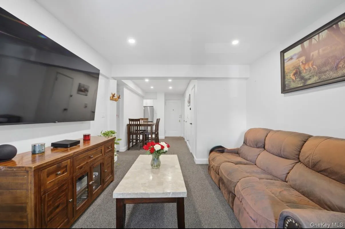 Interior featuring neutral wall paint, recessed lighting, and carpeting Interior featuring neutral wall paint, recessed lighting, and carpeting