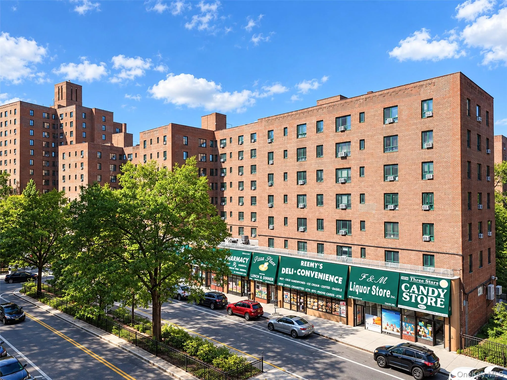 Multi-story brick facade featuring ground-level storefronts and a paved street frontage Multi-story brick facade featuring ground-level storefronts and a paved street frontage