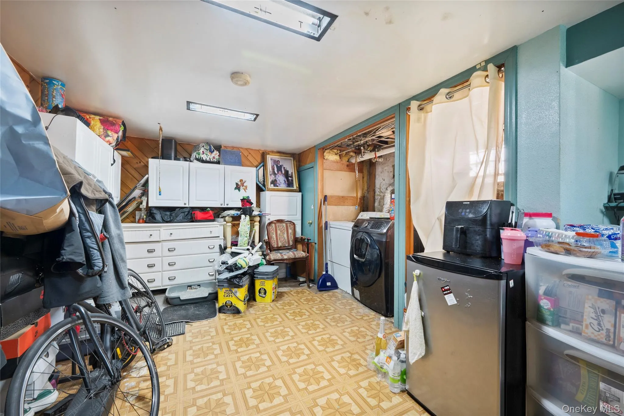 Basement with washer/dryer and large closets for storage. Basement with washer/dryer and large closets for storage.