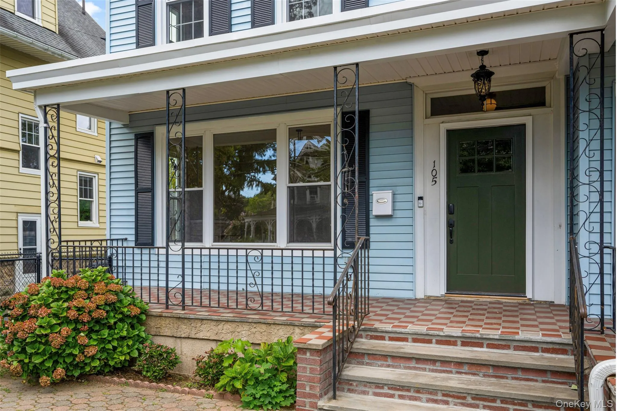 Doorway to residence with a porch Doorway to residence with a porch