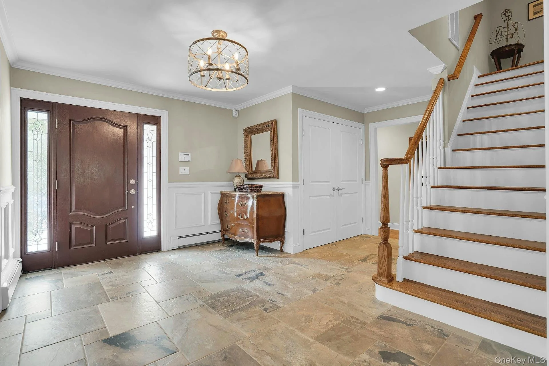 Gorgeous entry door and stne flooring. Gorgeous entry door and stne flooring.