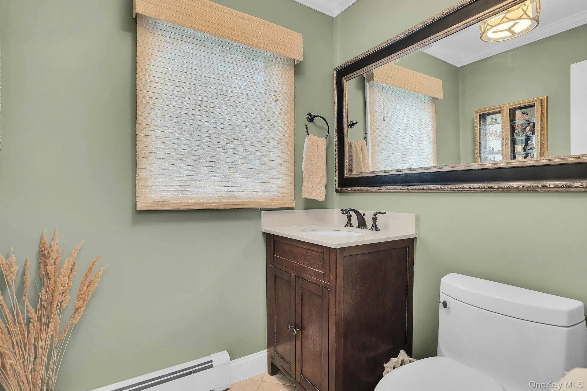 Half bath off of kitchen for easy pool access. Half bath off of kitchen for easy pool access.