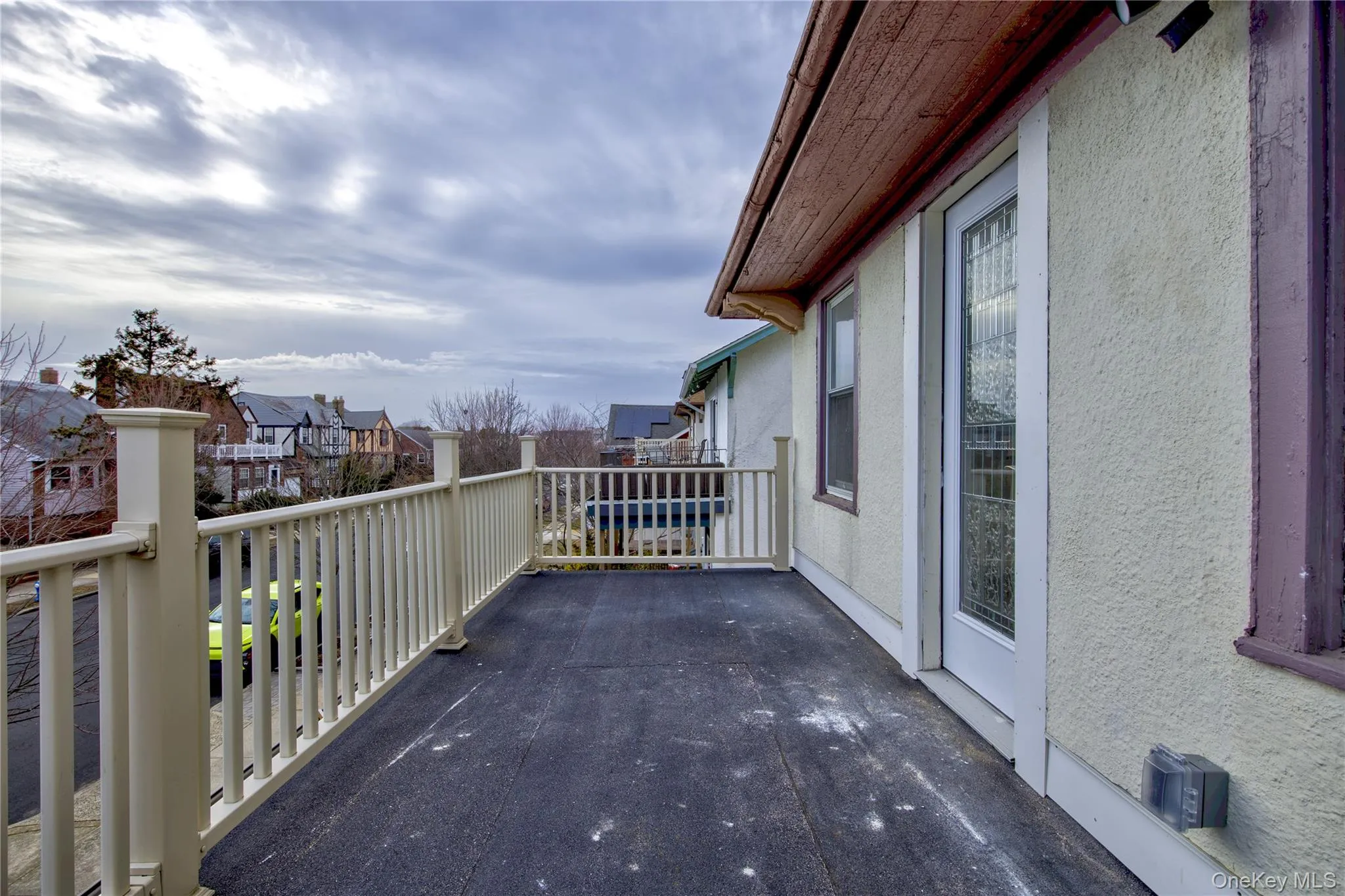 Balcony featuring a residential view Balcony featuring a residential view