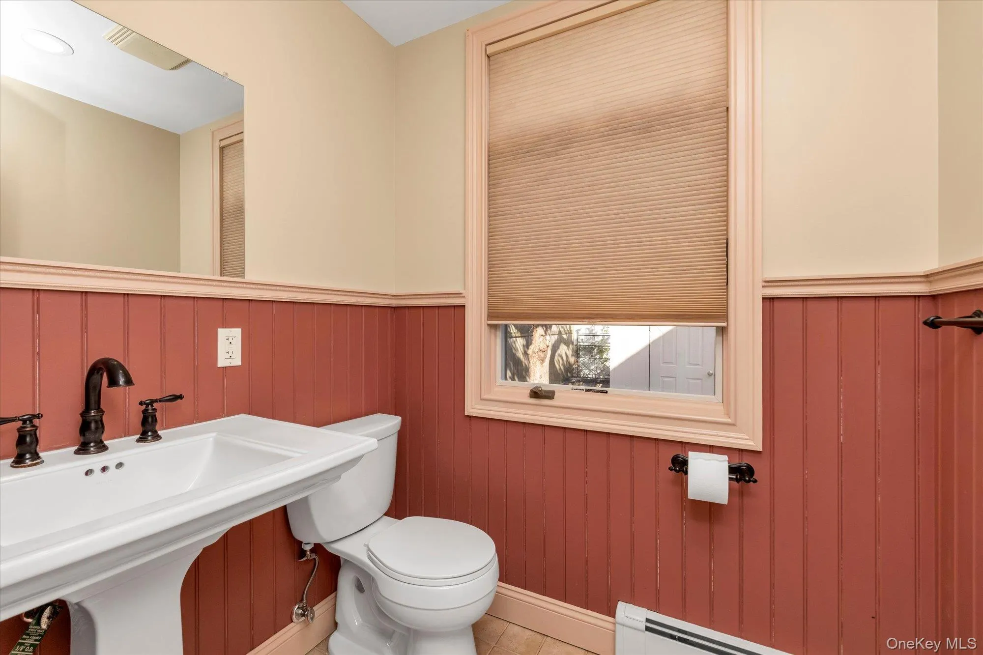 Half Bath off of the Den. Half Bath off of the Den.
