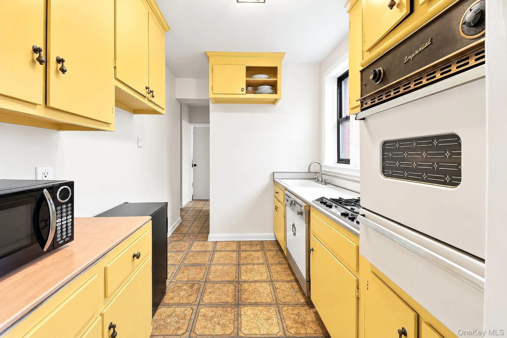 Original windowed kitchen from the 50's in need of a remodel Original windowed kitchen from the 50's in need of a remodel