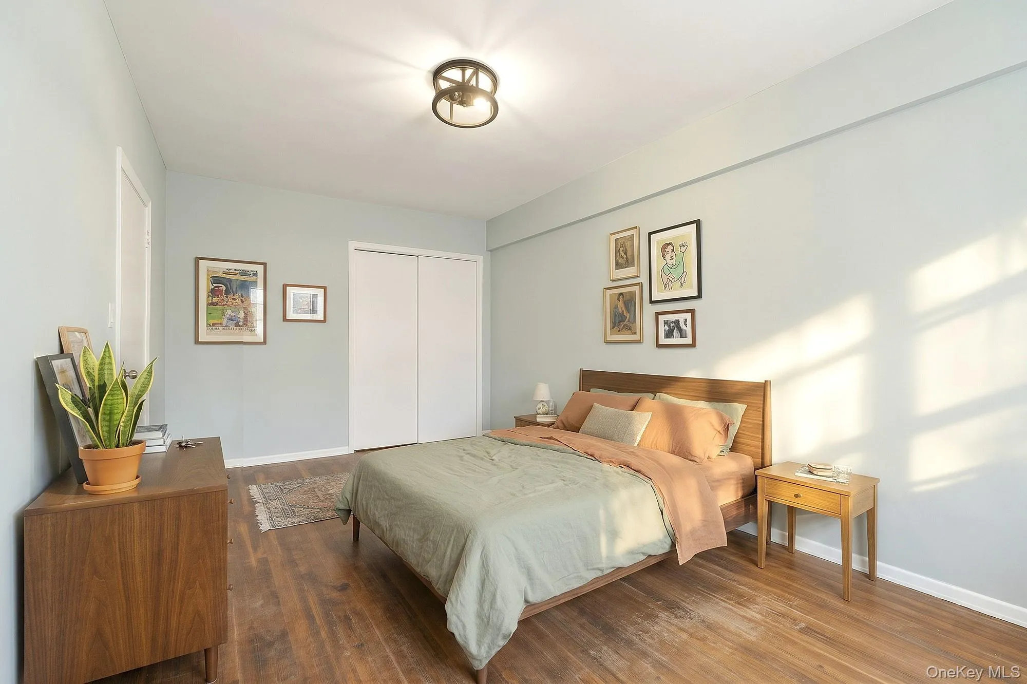 Large second bedroom with hardwood floors that need TLC Large second bedroom with hardwood floors that need TLC
