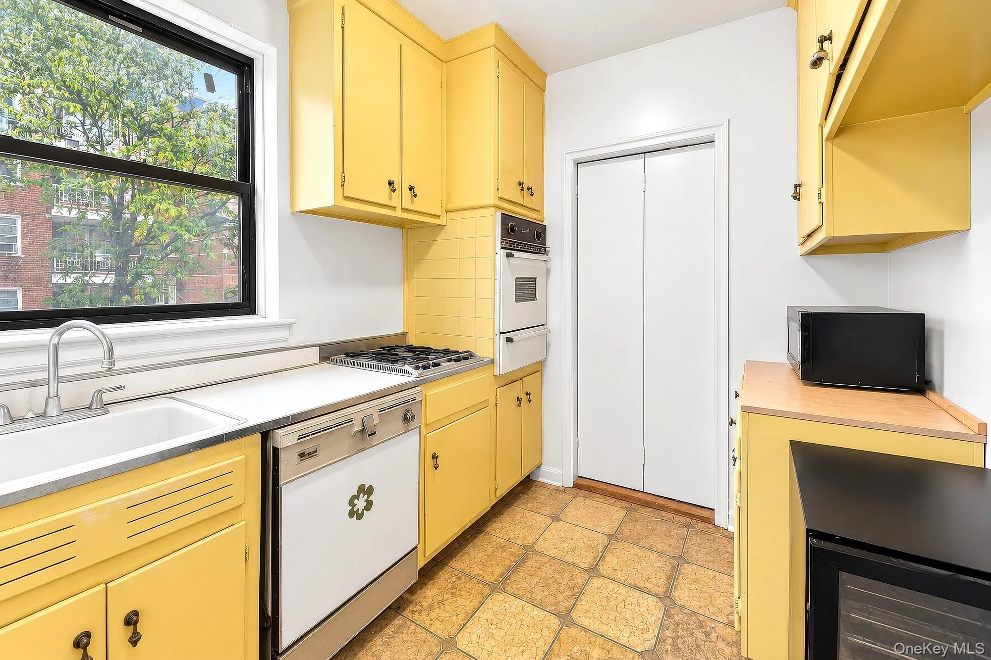 Original windowed kitchen from the 50's in need of a remodel Original windowed kitchen from the 50's in need of a remodel