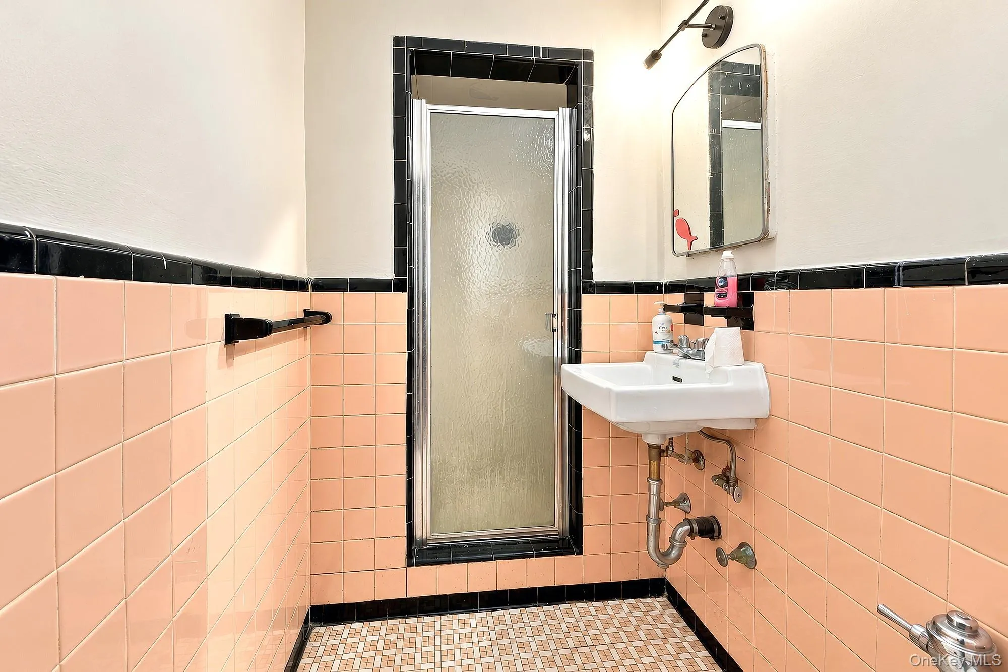 En-suite primary bath with walk-in shower, needs TLC En-suite primary bath with walk-in shower, needs TLC