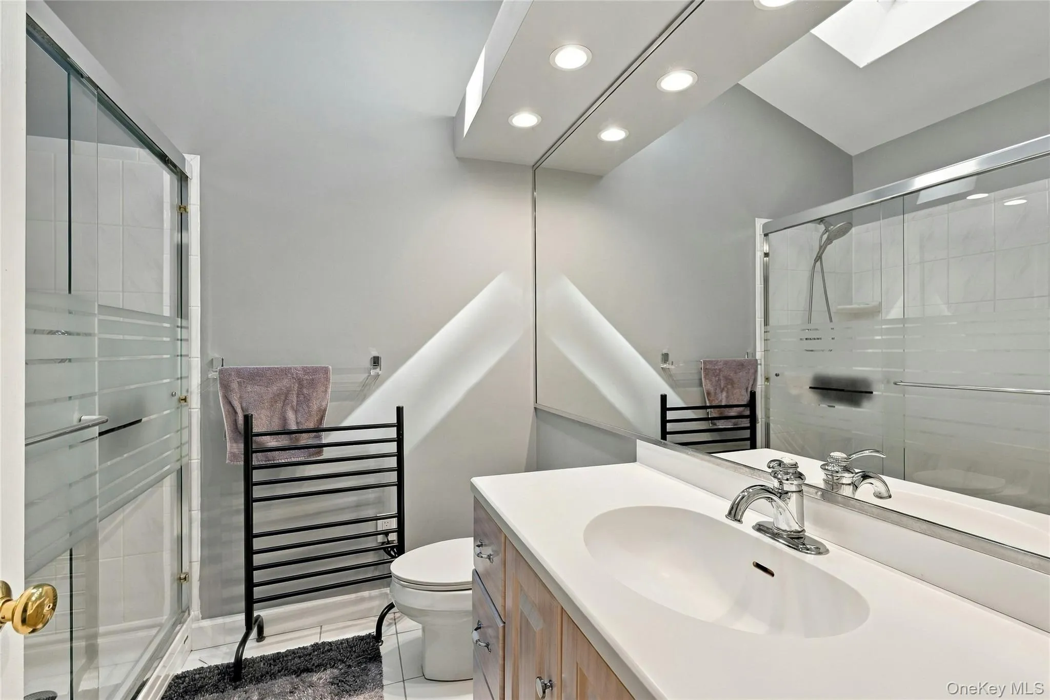 Ensuite Bathroom with walk in shower and skylight 7 x 6 sq ft Ensuite Bathroom with walk in shower and skylight 7 x 6 sq ft