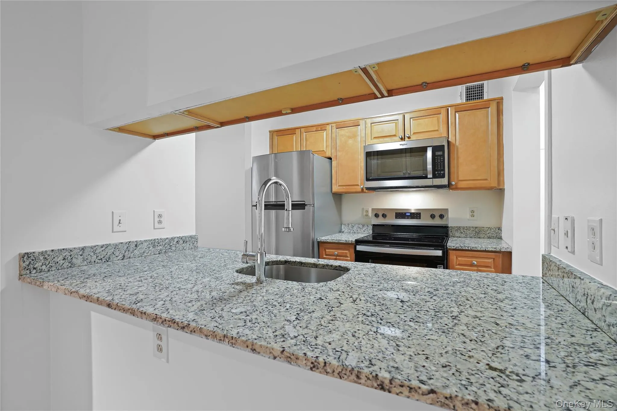 Kitchen open to living room. Kitchen open to living room.
