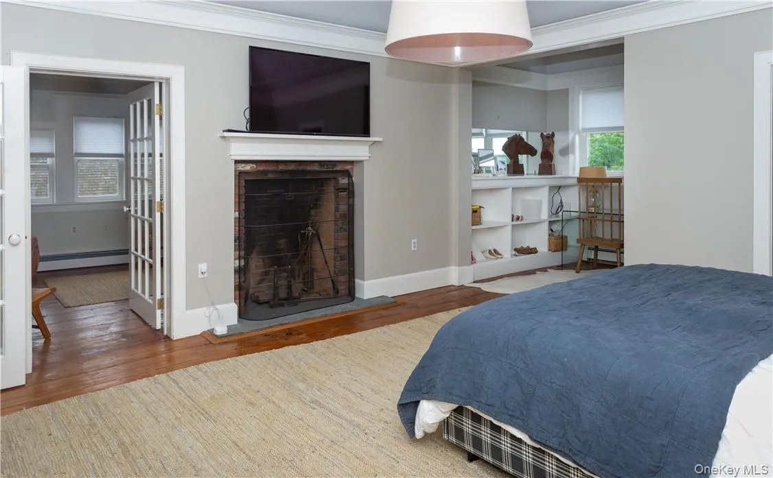 Expansive primary suite. Door on the left leads to a sitting area. Expansive primary suite. Door on the left leads to a sitting area.