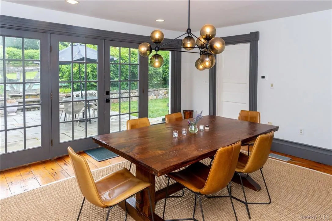 Formal dining room with access to the private back patio. Formal dining room with access to the private back patio.