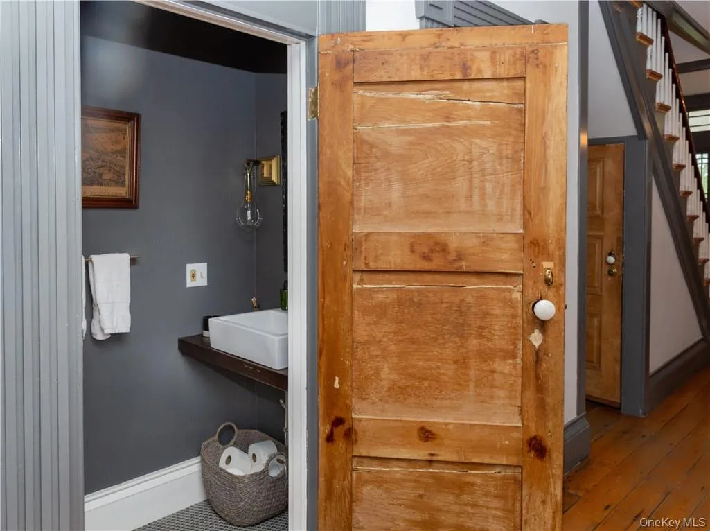 This powder room is off of the two parlor rooms and formal dining room. This powder room is off of the two parlor rooms and formal dining room.