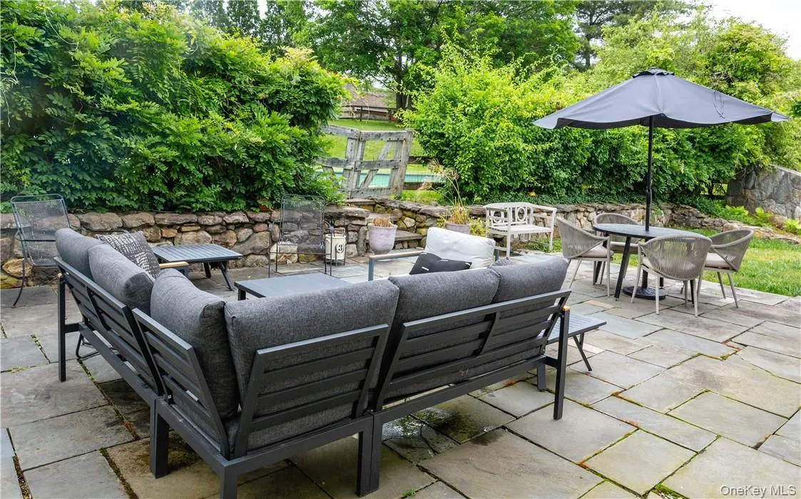 Expansive patio area just off of the formal dining room. Expansive patio area just off of the formal dining room.