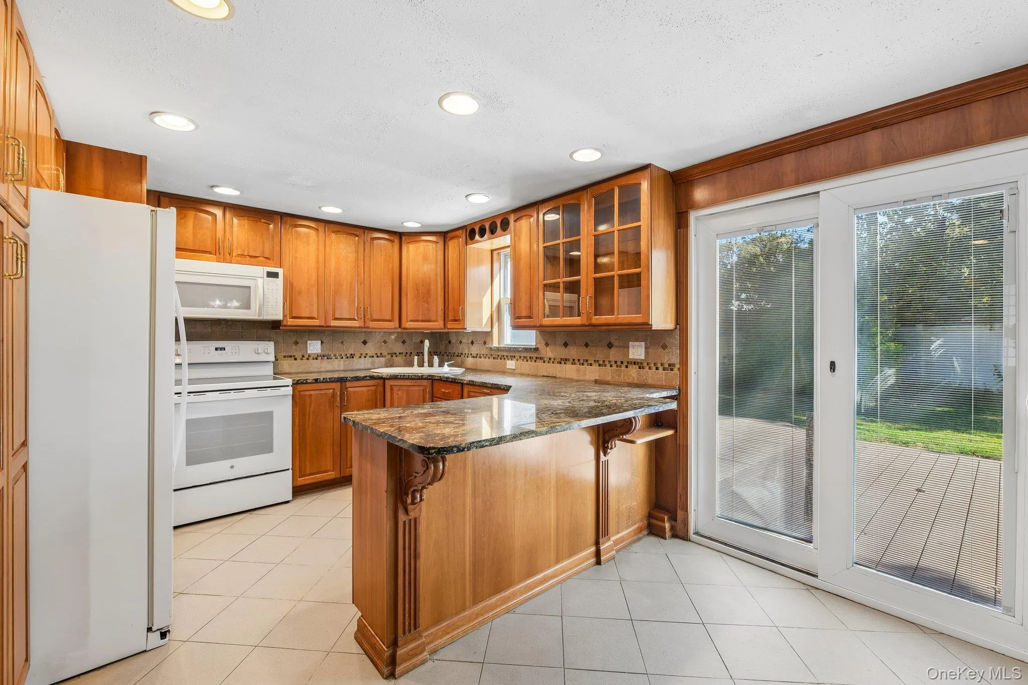 Kitchen with Sliding Glass Door to Backyard Kitchen with Sliding Glass Door to Backyard