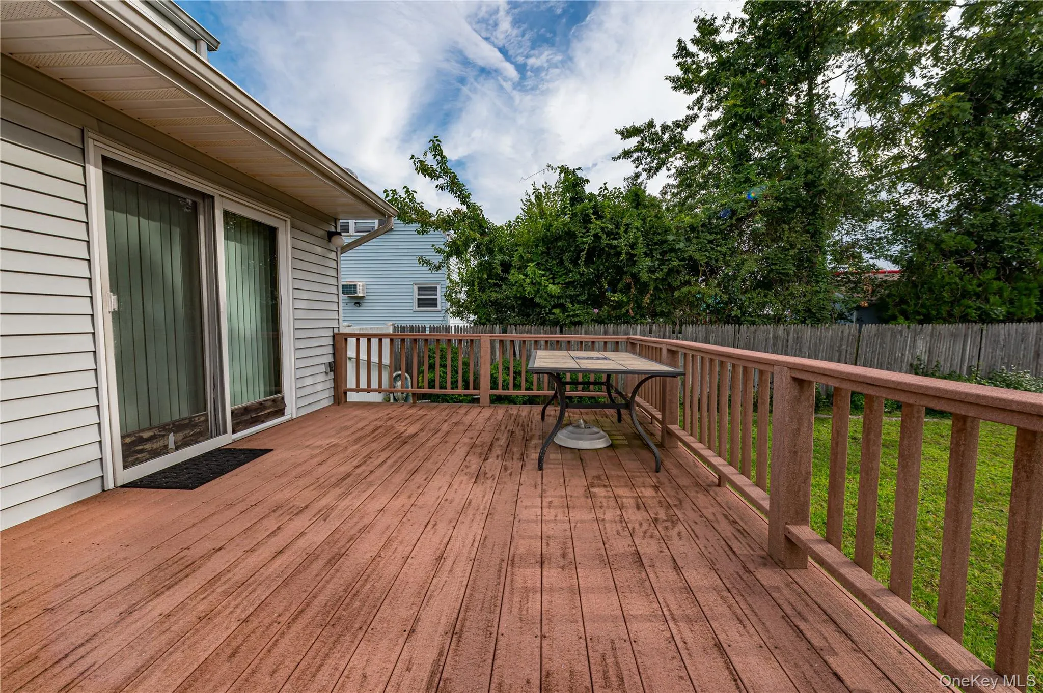 Deck off of Dining Room. Perfect for summer BBQ's Deck off of Dining Room. Perfect for summer BBQ's
