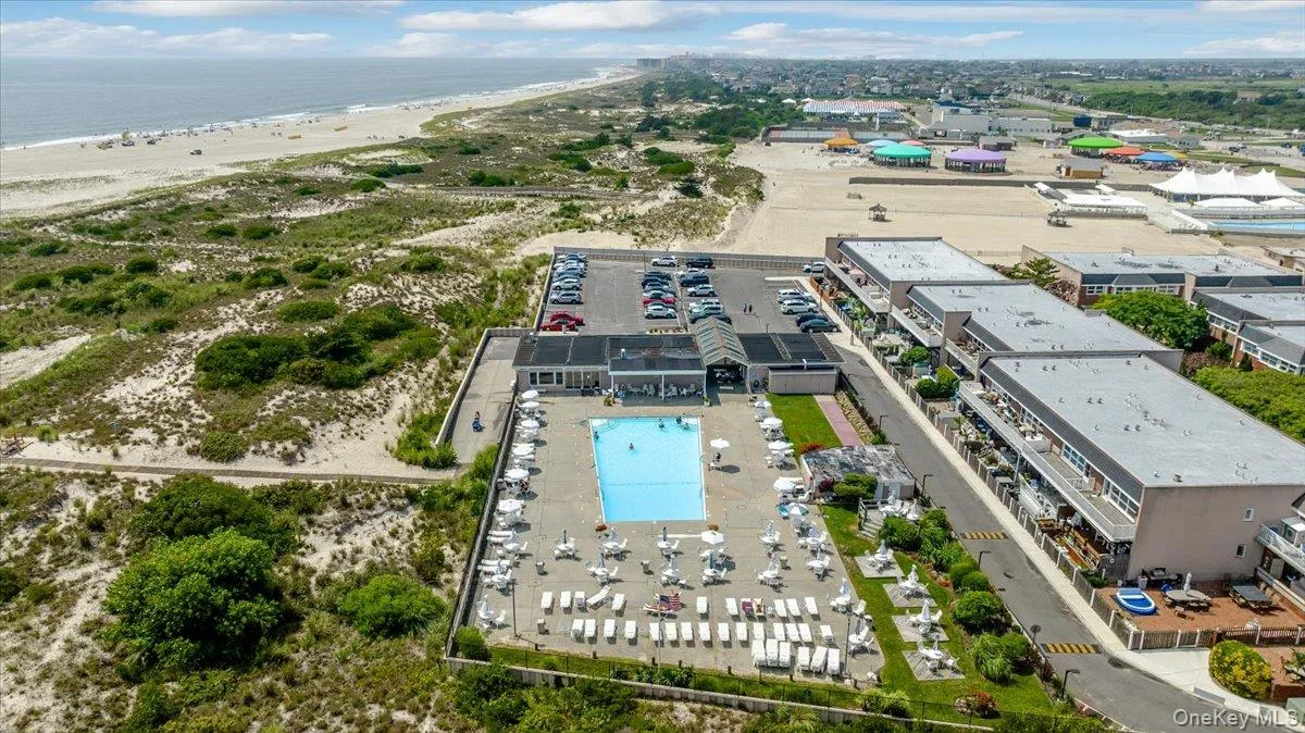 Bird's eye view with a water view and a beach view Bird's eye view with a water view and a beach view