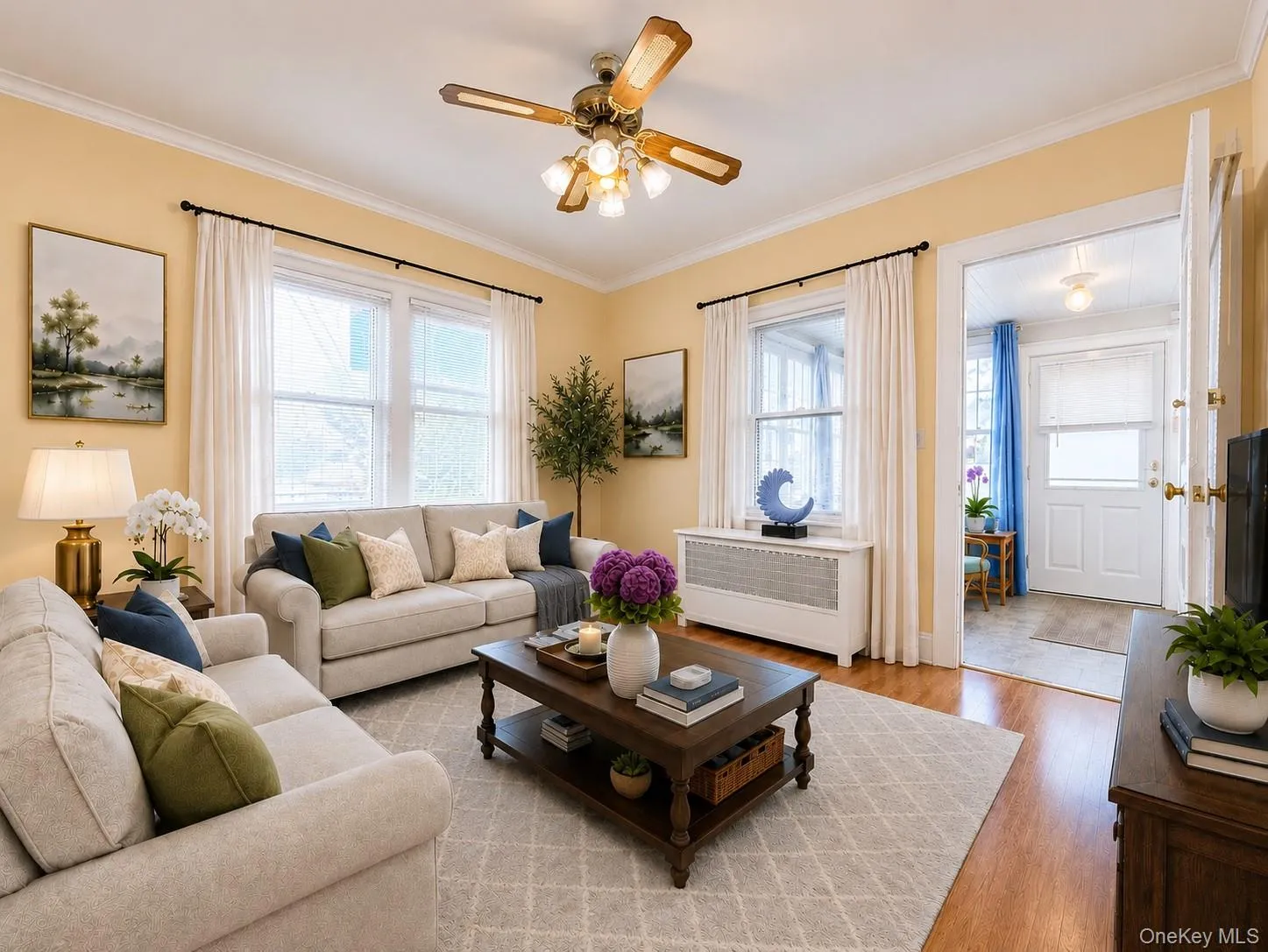 Virtually staged living room showing a possible furniture arrangement. Virtually staged living room showing a possible furniture arrangement.