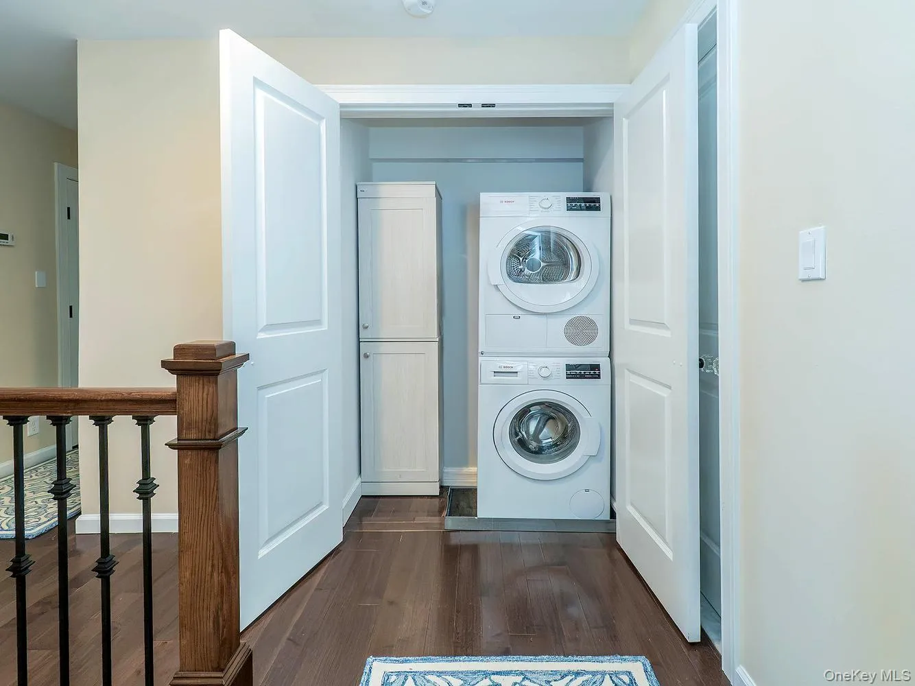 Stackable laundry hallway on second floor Stackable laundry hallway on second floor