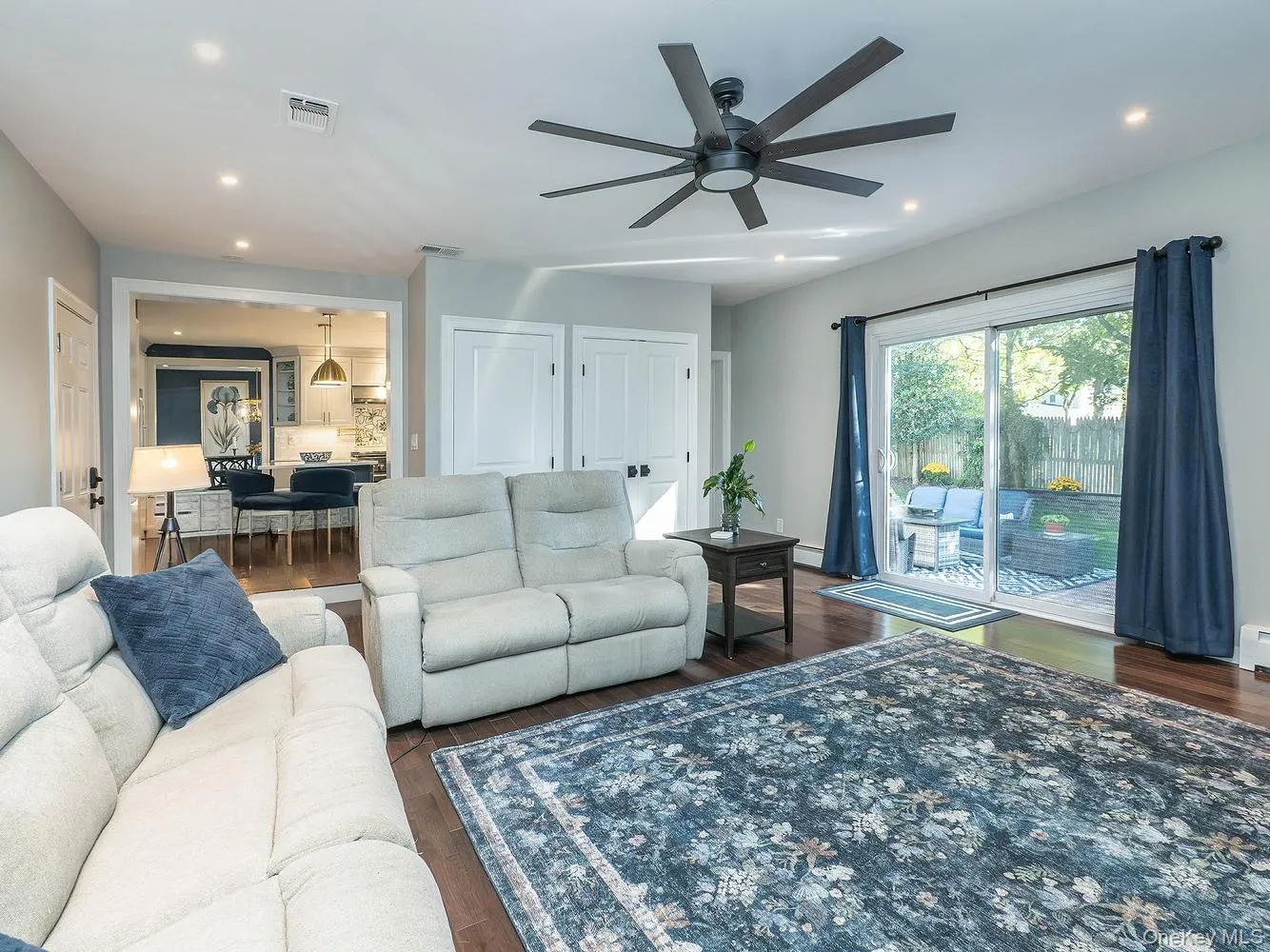 Family room/ Den with several closets and a half bath Family room/ Den with several closets and a half bath