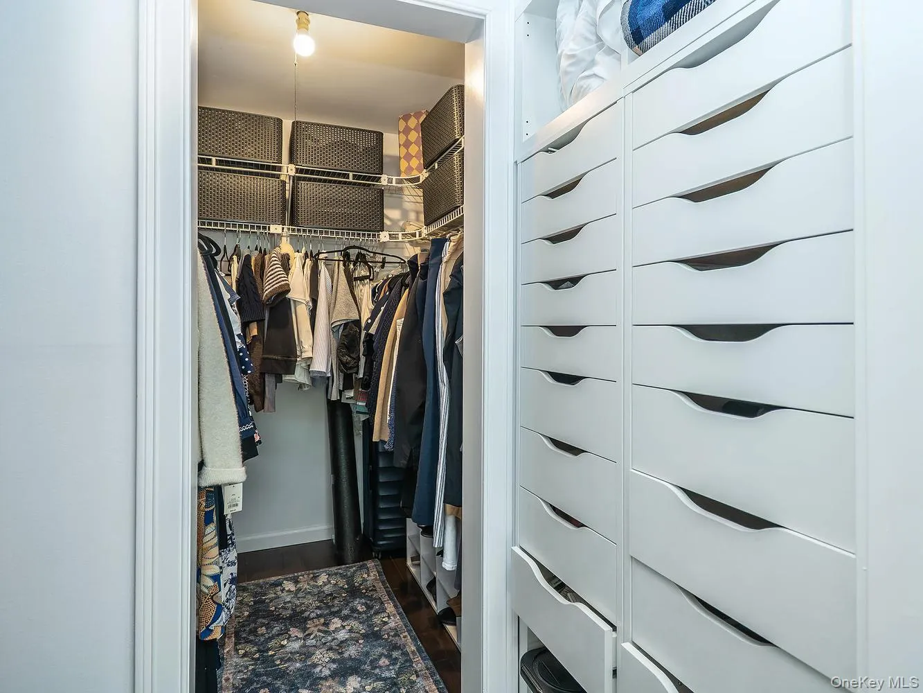 Walk in closet attached to primary bedroom Walk in closet attached to primary bedroom
