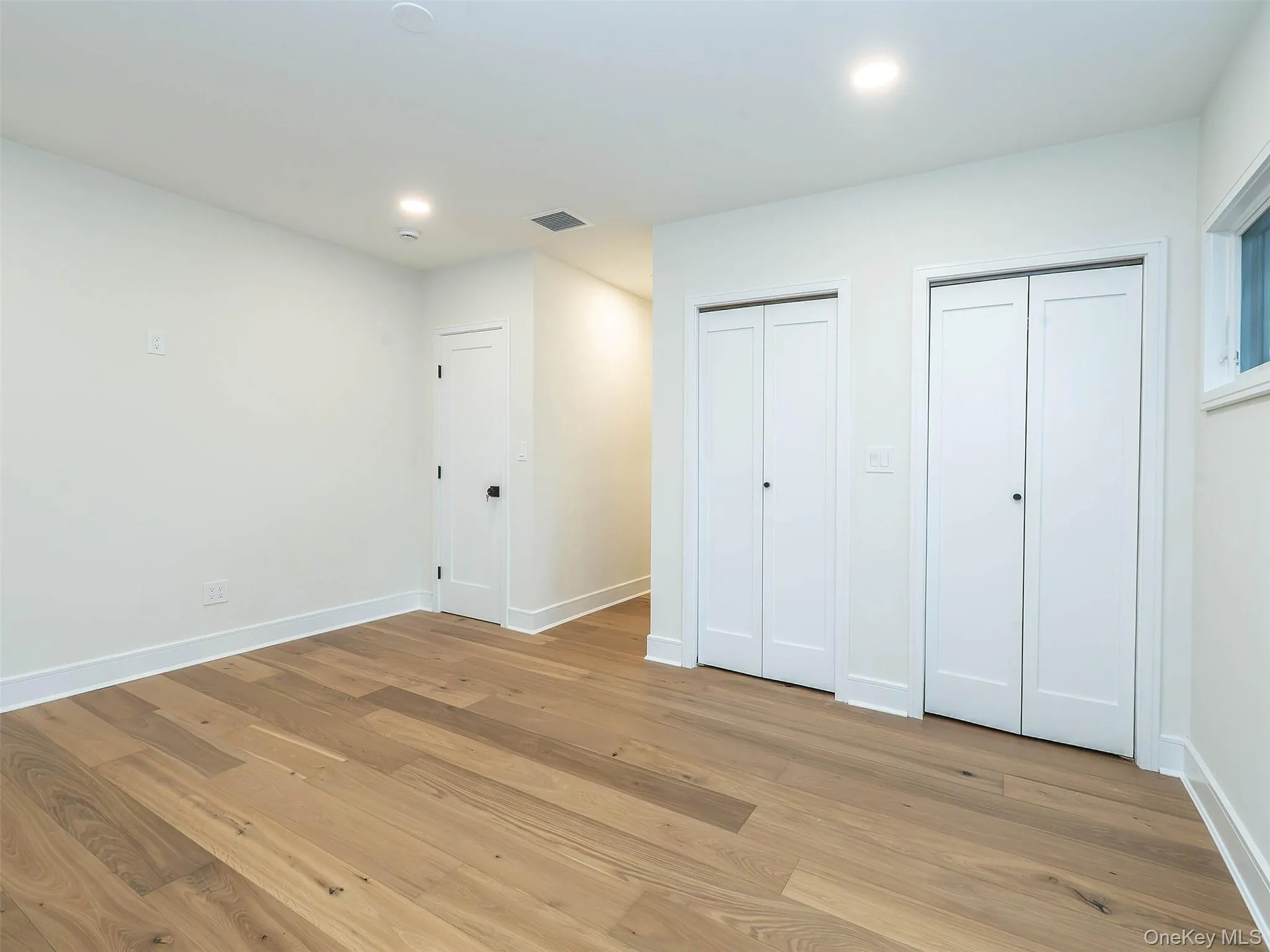 1st Floor: Primary bedroom w/3 closets 1st Floor: Primary bedroom w/3 closets