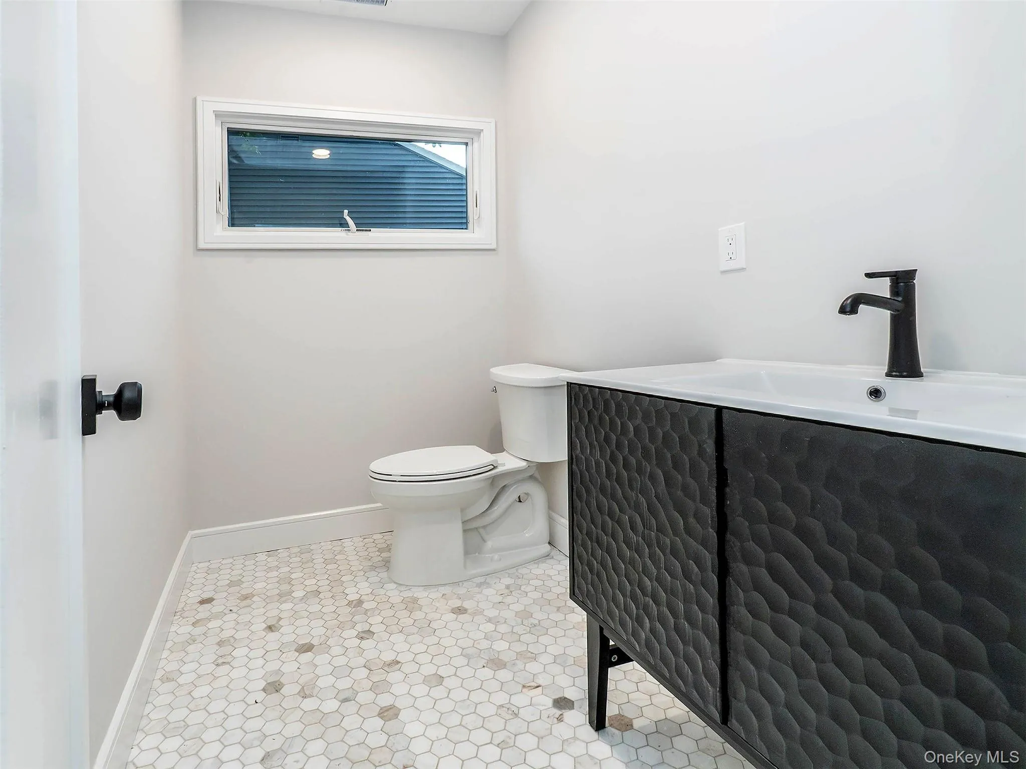 1st Floor: 1.2 bath off the kitchen hall. 1st Floor: 1.2 bath off the kitchen hall.