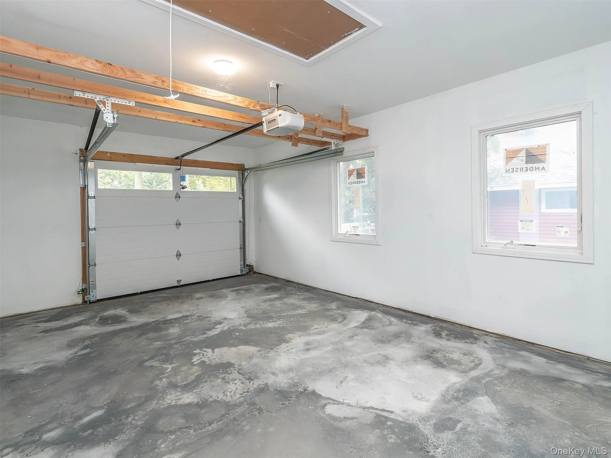 Poured concrete floor, pull down for attic and electrical box live here Poured concrete floor, pull down for attic and electrical box live here