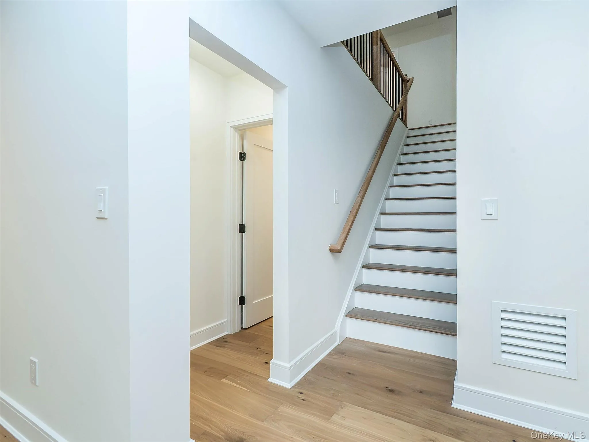 Stairs leading to the 2nd floor with an additional 2 beds + 1 bath Stairs leading to the 2nd floor with an additional 2 beds + 1 bath