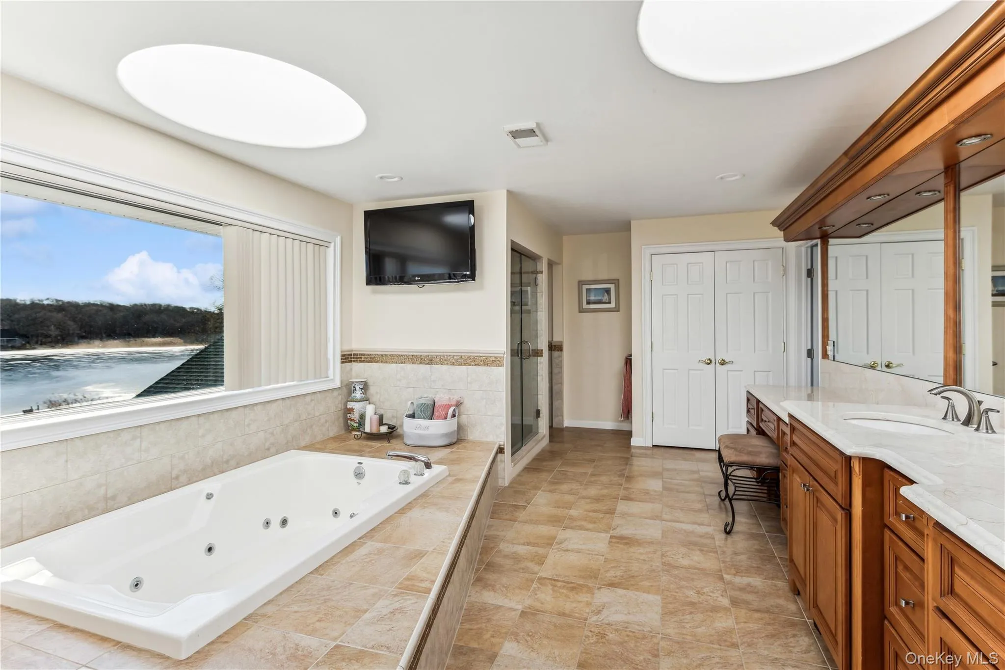 Bathroom with vanity and separate shower and tub Bathroom with vanity and separate shower and tub