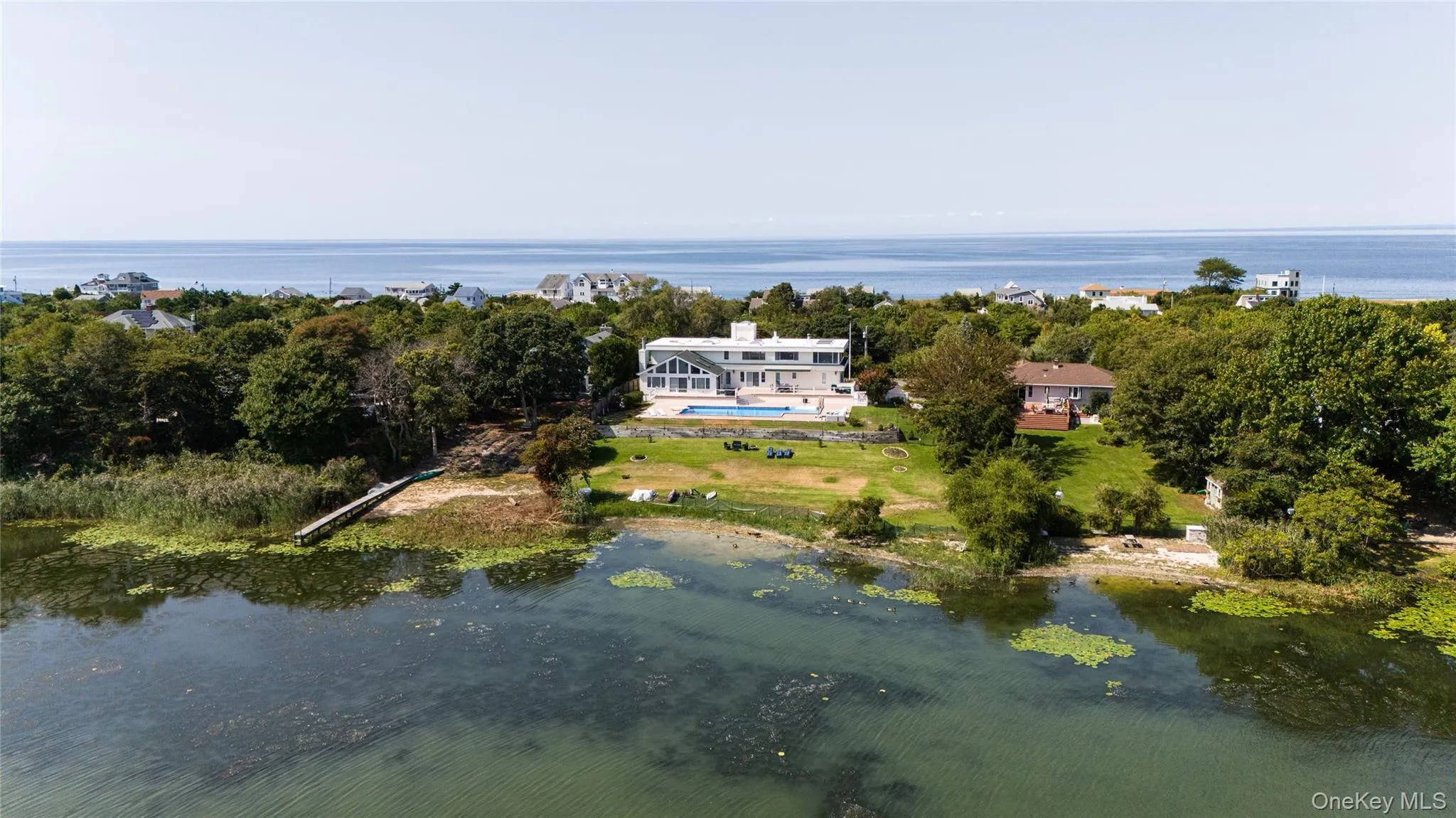 Bird's eye view featuring a water view Bird's eye view featuring a water view
