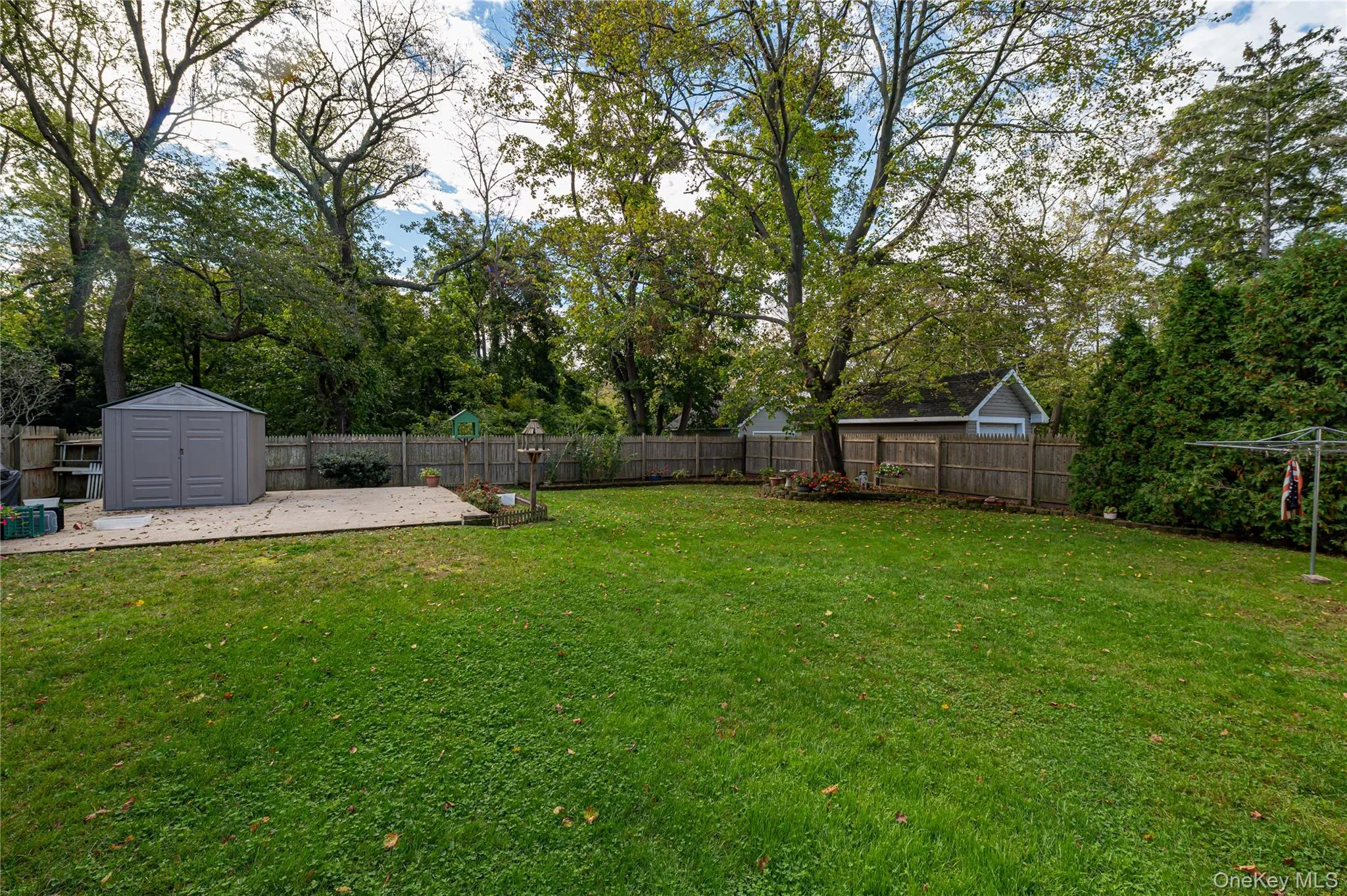Shed is a gift. Sits atop a cement pad which was installed to accommodate a 2 car garage that was demolished in approximately 1986. Permit for structure was closed. Possibilities… Shed is a gift. Sits atop a cement pad which was installed to accommodate a 2 car garage that was demolished in approximately 1986. Permit for structure was closed. Possibilities…