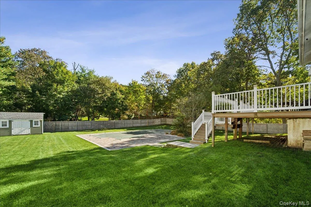 Completely fenced backyard with two sheds. Completely fenced backyard with two sheds.