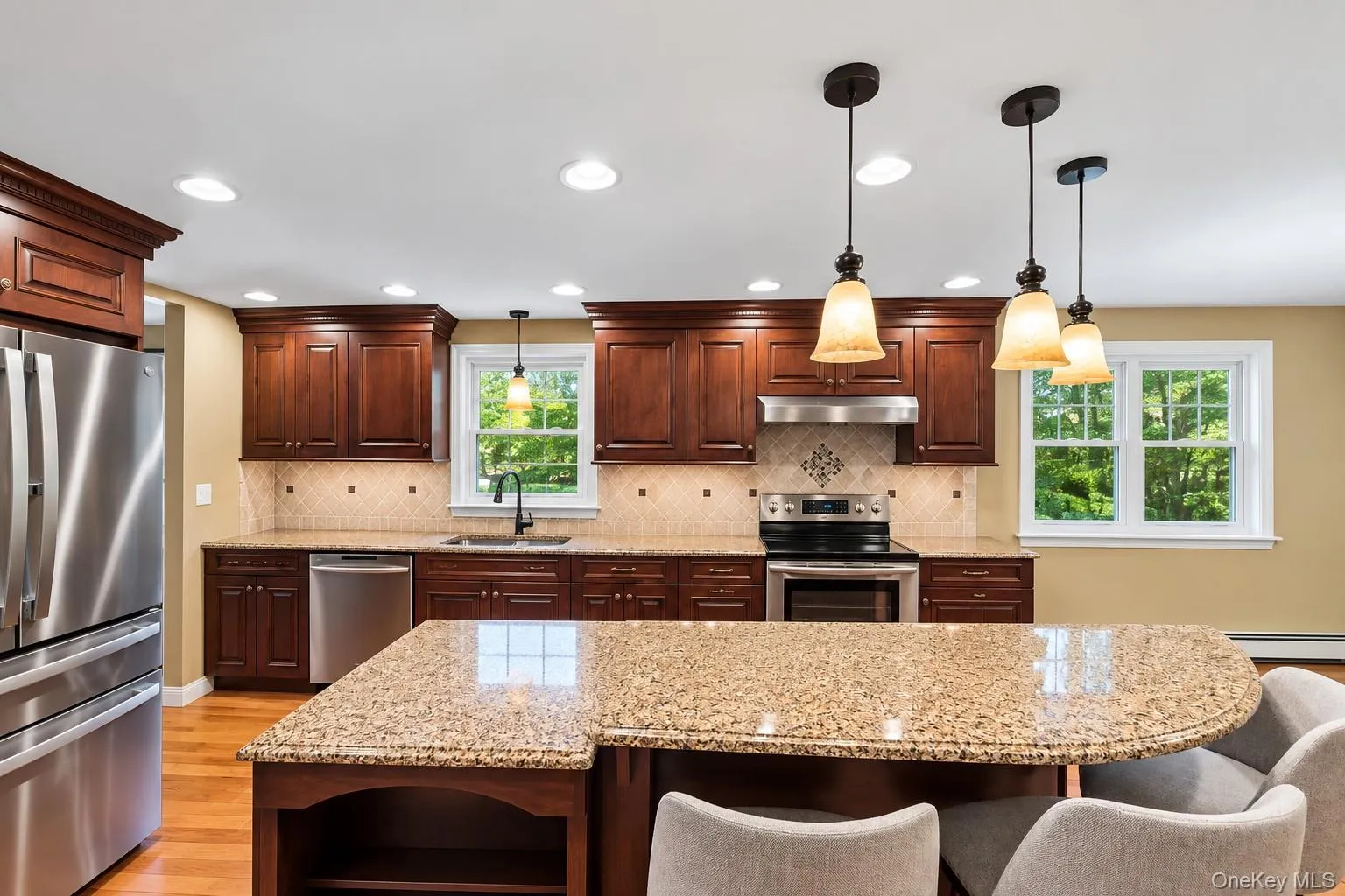 Wood Mode/Brookhaven cabinetry installed by Island Kitchen and Bath in 2012. Wood Mode/Brookhaven cabinetry installed by Island Kitchen and Bath in 2012.